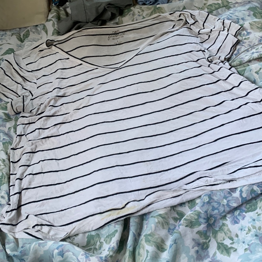 super cute and i actually love this shirt. coffee fucking stain at the bottom😐